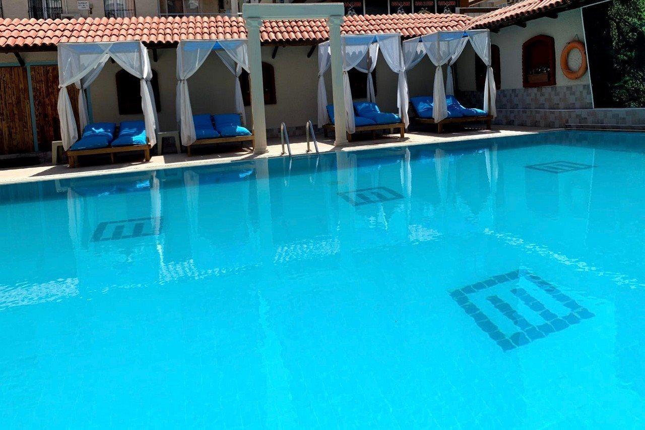 Duqqan Deluxe Hotel คูซาดาซี ภายนอก รูปภาพ