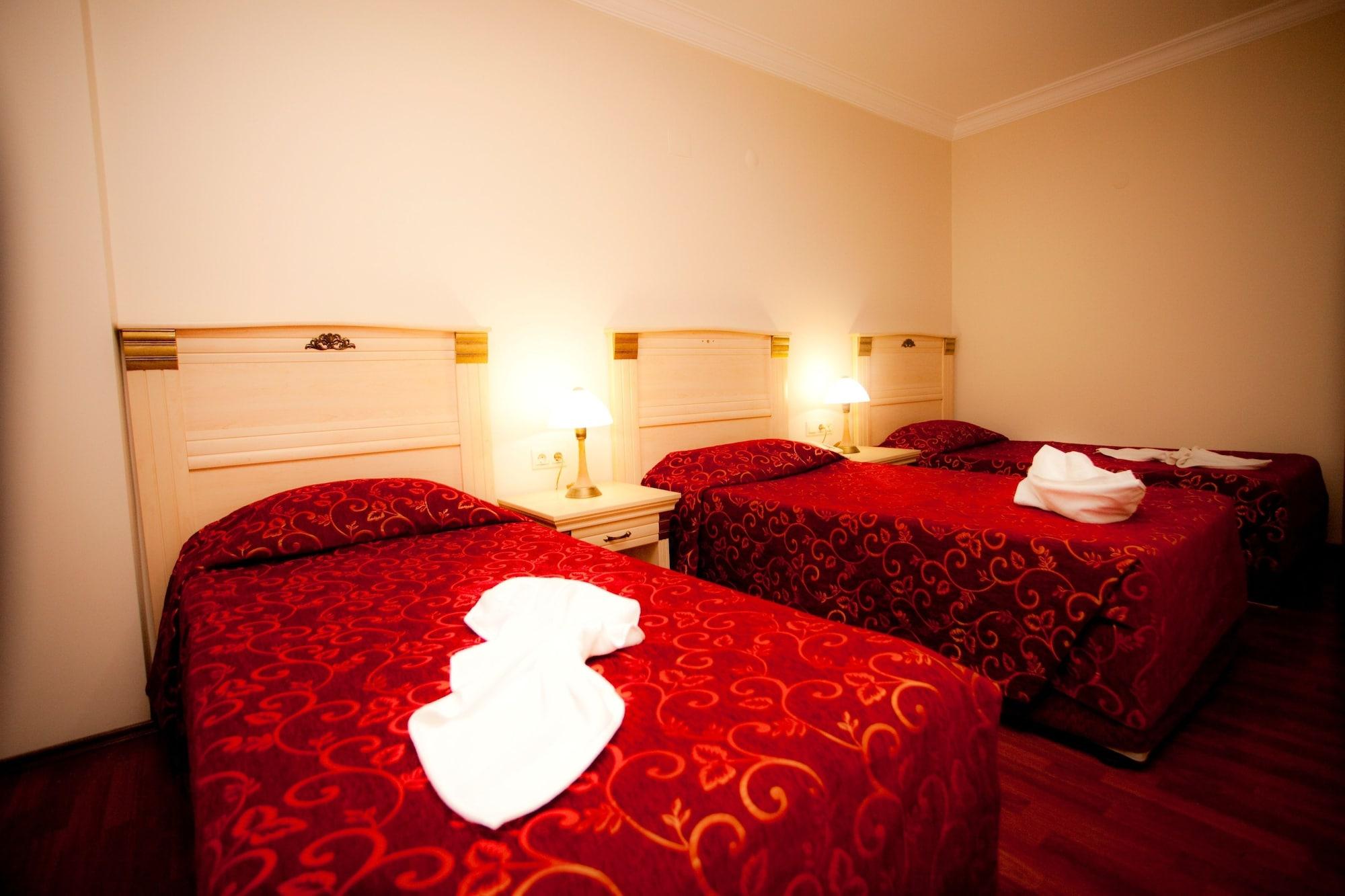 Duqqan Deluxe Hotel คูซาดาซี ภายนอก รูปภาพ