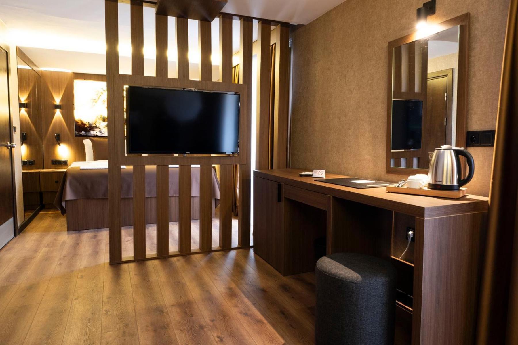 Duqqan Deluxe Hotel คูซาดาซี ภายนอก รูปภาพ