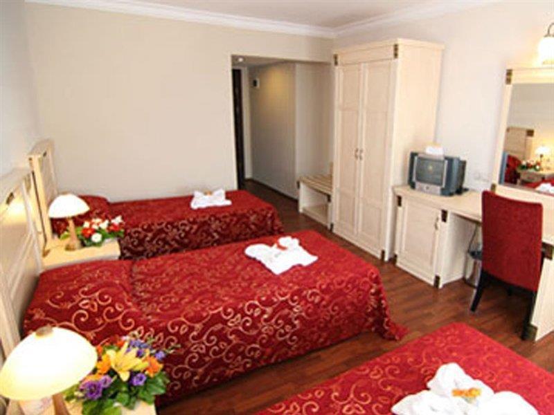 Duqqan Deluxe Hotel คูซาดาซี ภายนอก รูปภาพ