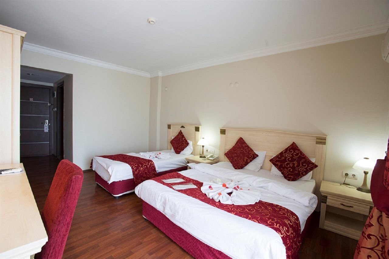 Duqqan Deluxe Hotel คูซาดาซี ภายนอก รูปภาพ